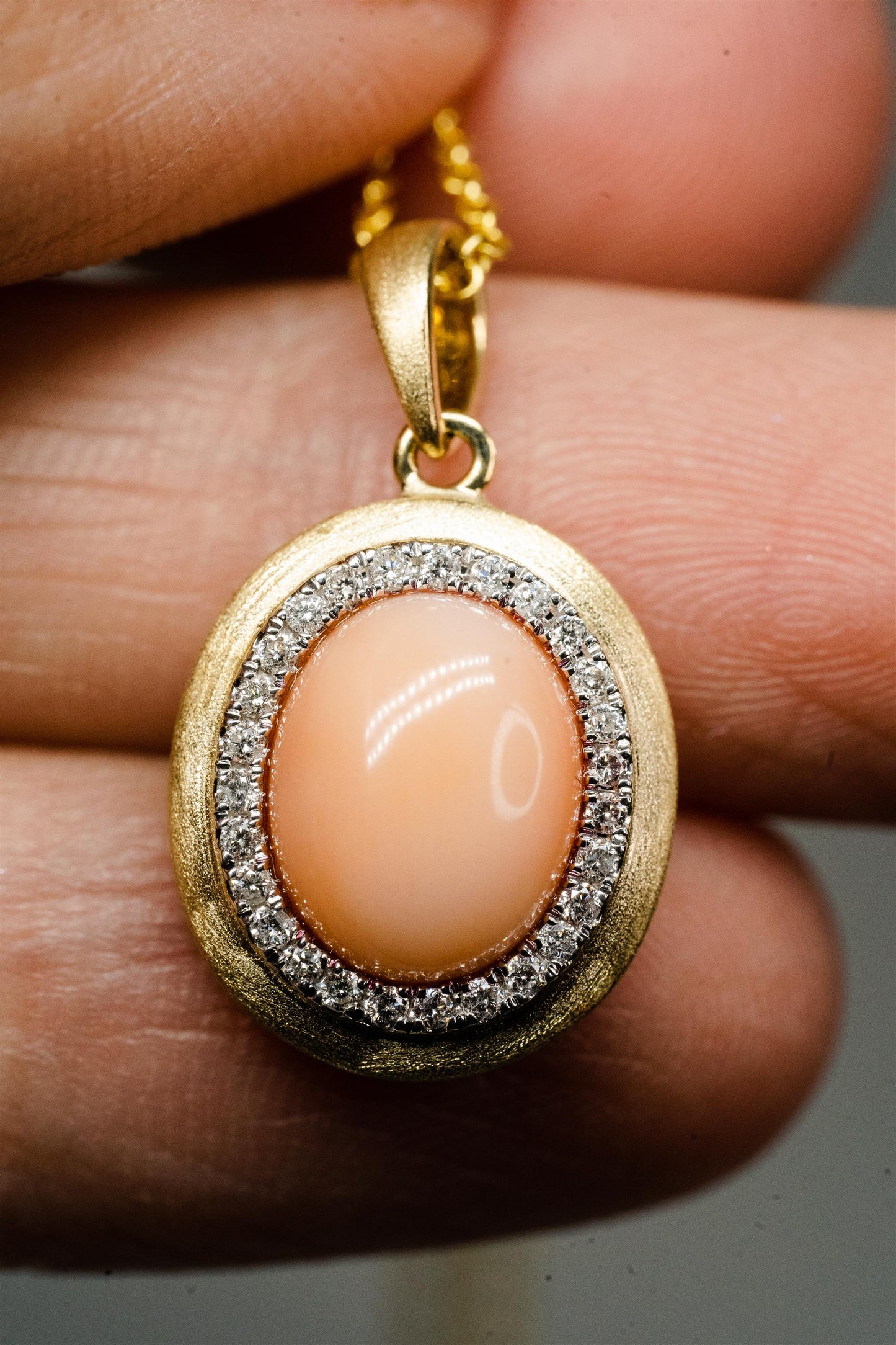 14K Yellow Gold 2.25ct Oval Shape Coral Bezel Set Necklace with 0.13tdw Diamonds