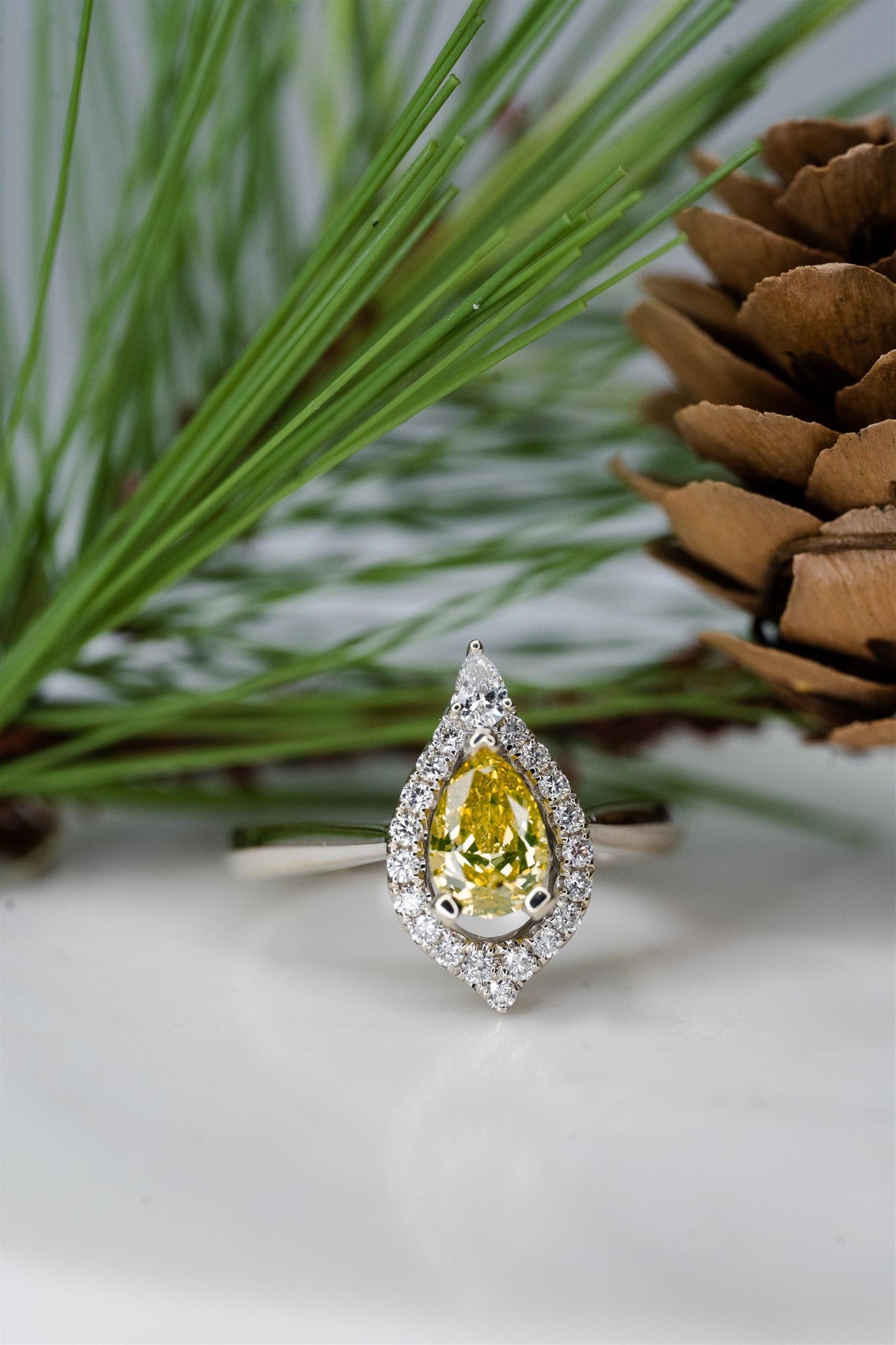 14K White Gold Intense Yellow Pear Diamond and Halo Ring