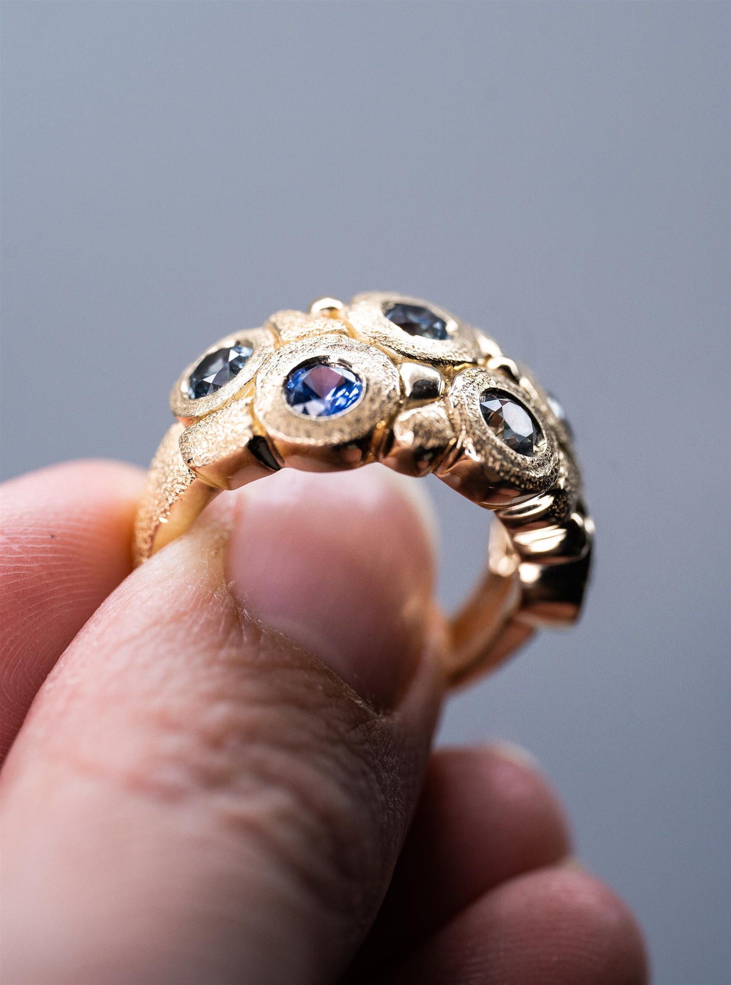 14K YG 6 Stone No Heat Sapphire Entropic Style Ring