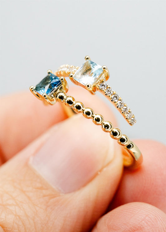 Blue Topaz And Diamond Ring