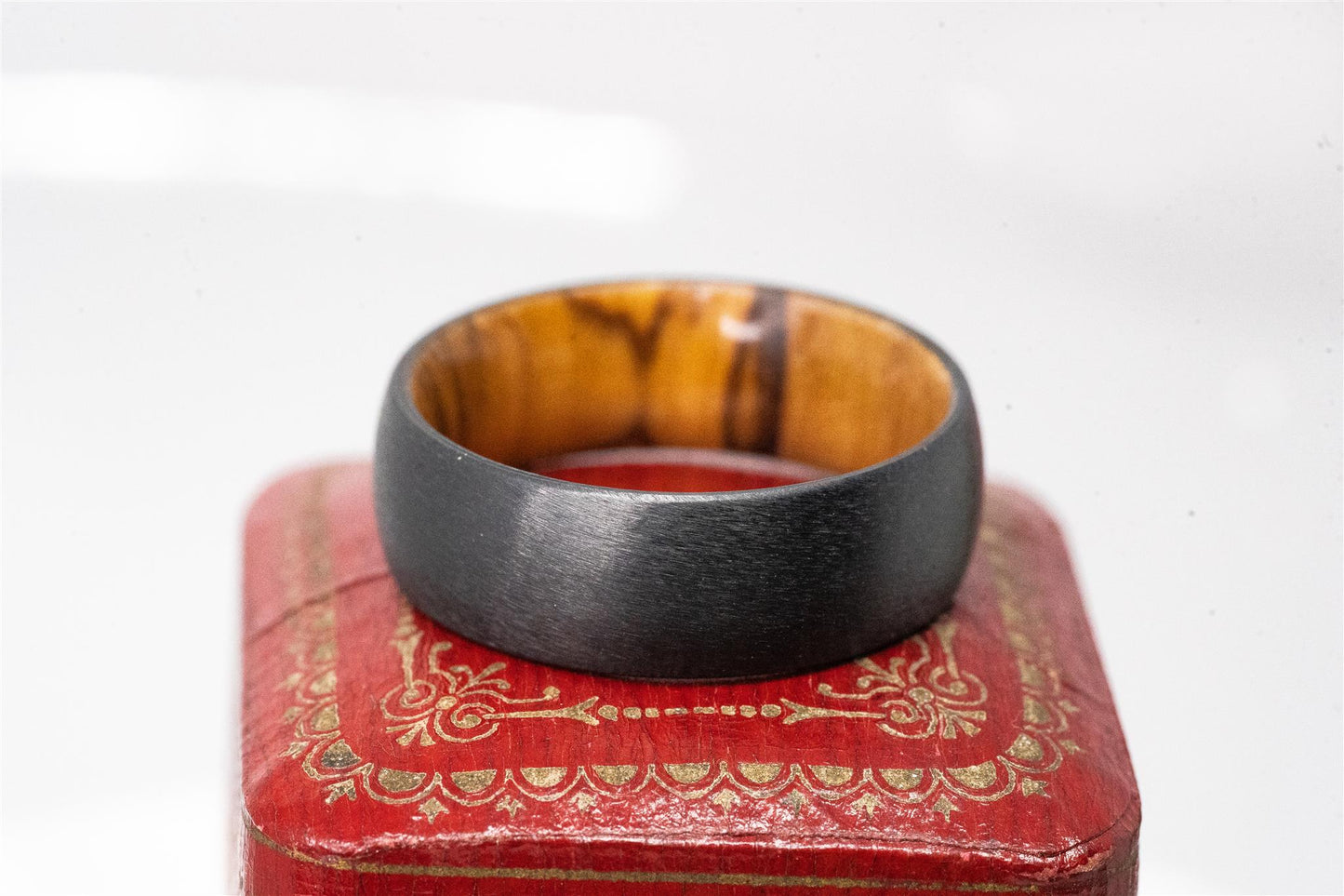 8mm Zirconium Ring w/ a Dome Satin Finish w/ an Inner Olive Wood Sleeve