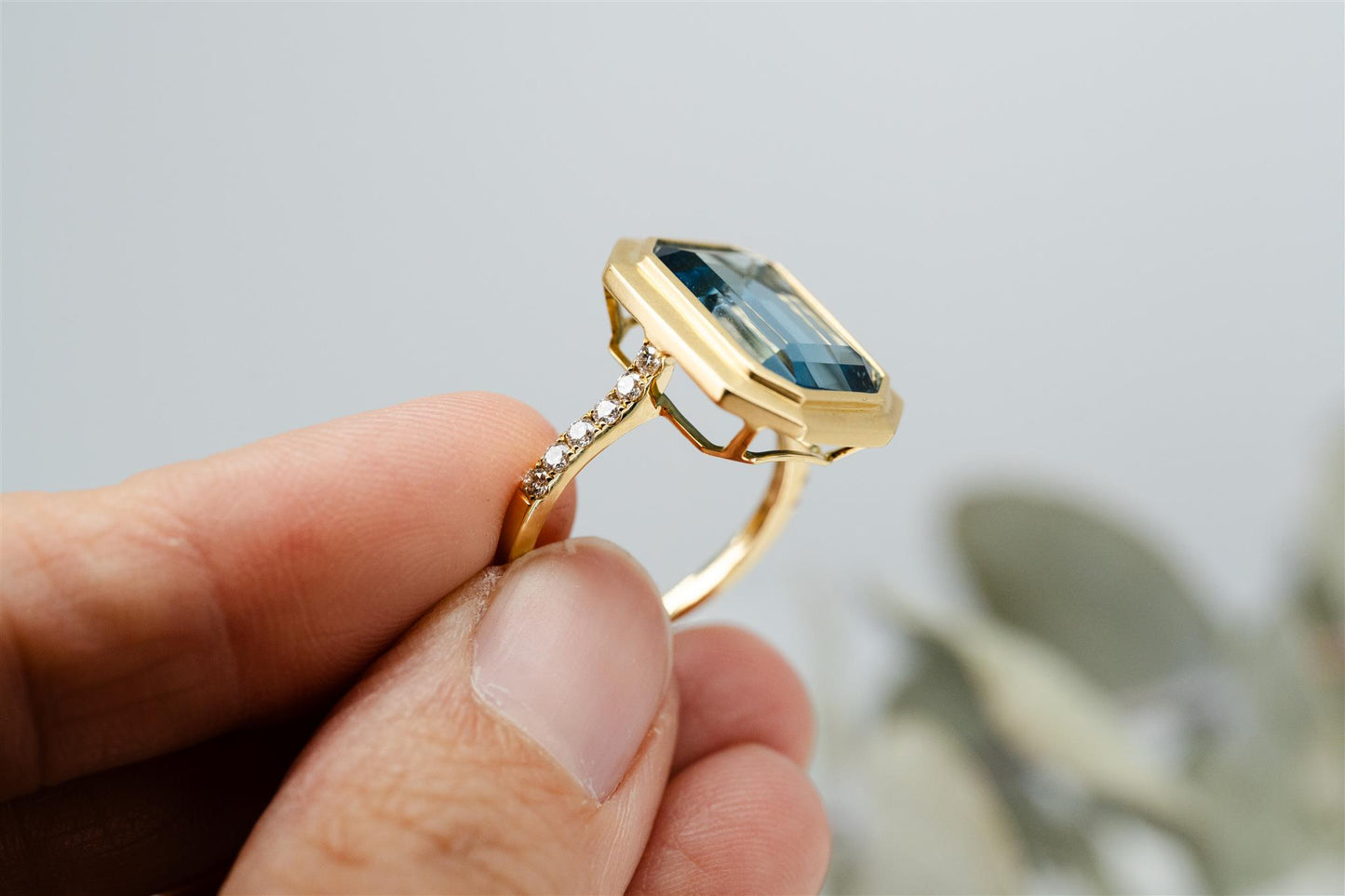 Blue Topaz And Diamond Ring