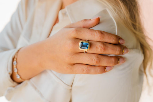 Blue Topaz And Diamond Ring